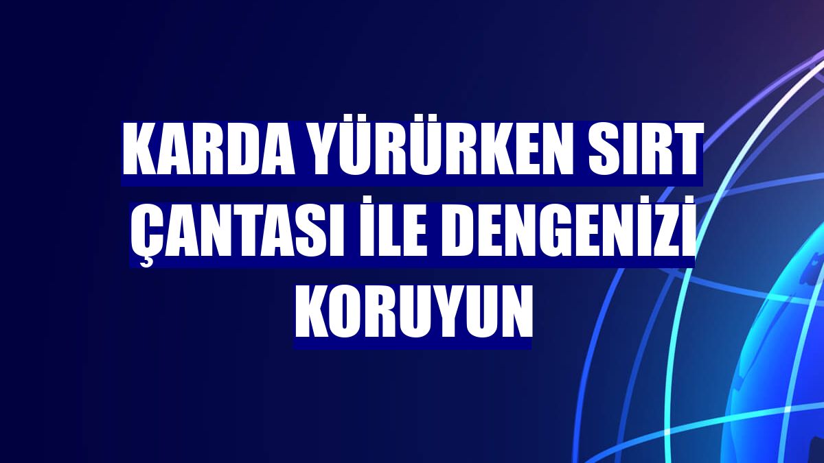 Karda yürürken sırt çantası ile dengenizi koruyun