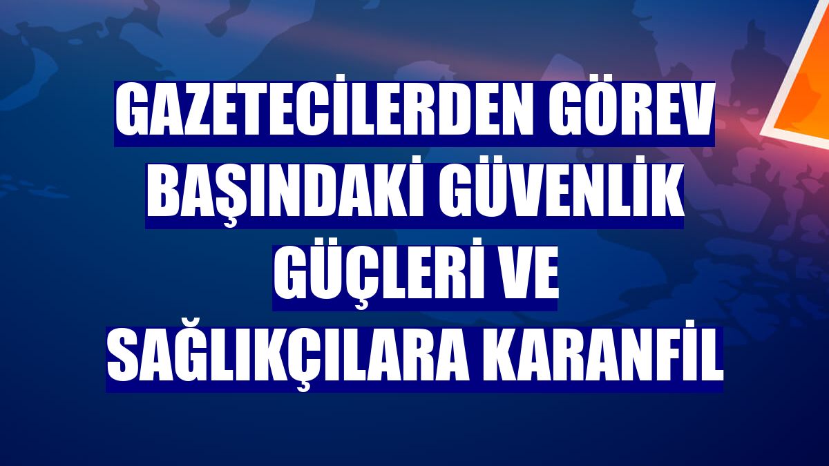 Gazetecilerden görev başındaki güvenlik güçleri ve sağlıkçılara karanfil
