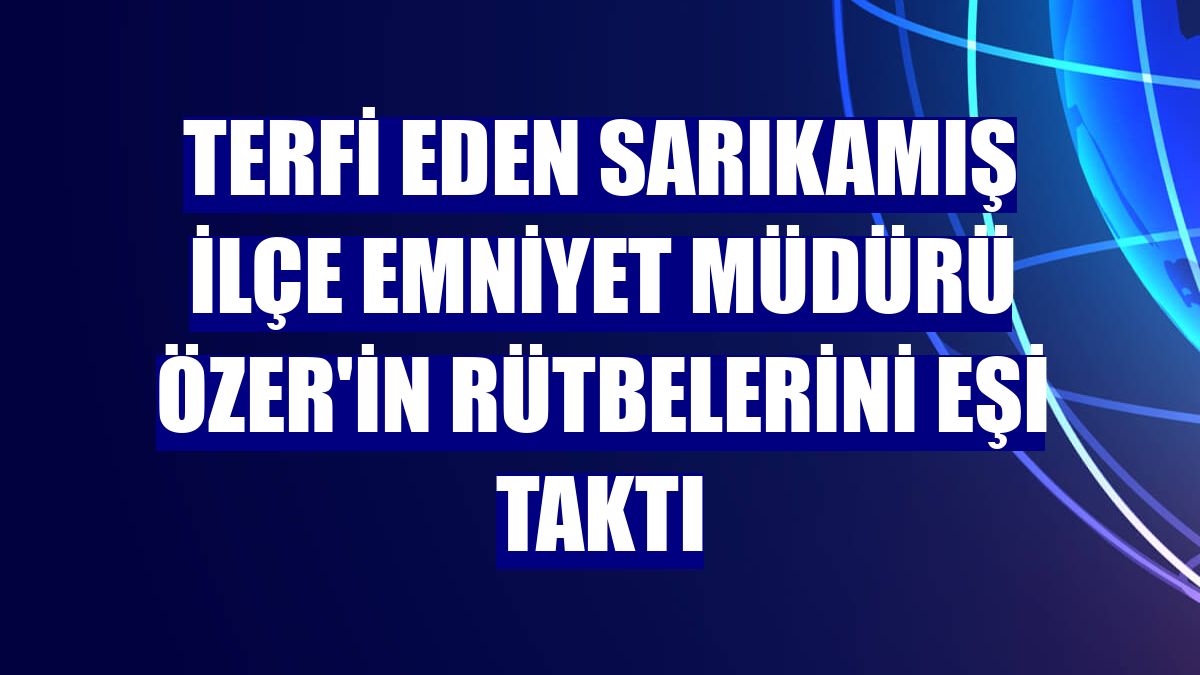 Terfi eden Sarıkamış İlçe Emniyet Müdürü Özer'in rütbelerini eşi taktı
