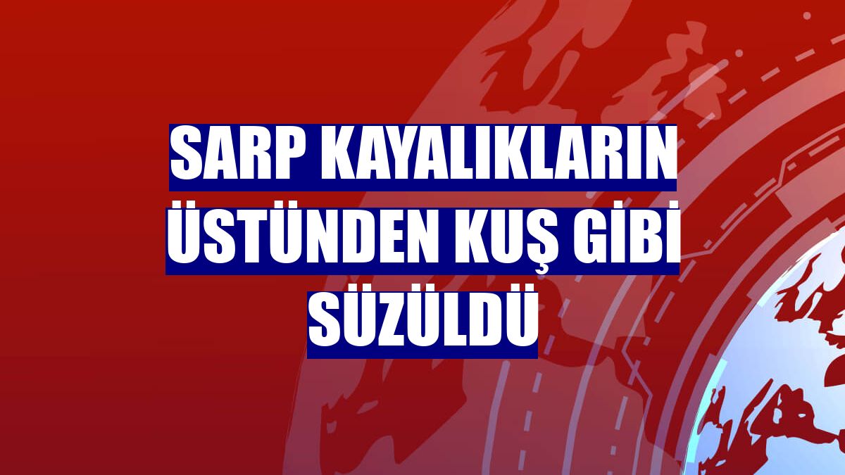 Sarp kayalıkların üstünden kuş gibi süzüldü