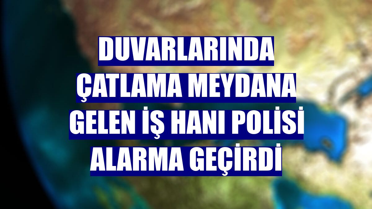 Duvarlarında çatlama meydana gelen iş hanı polisi alarma geçirdi