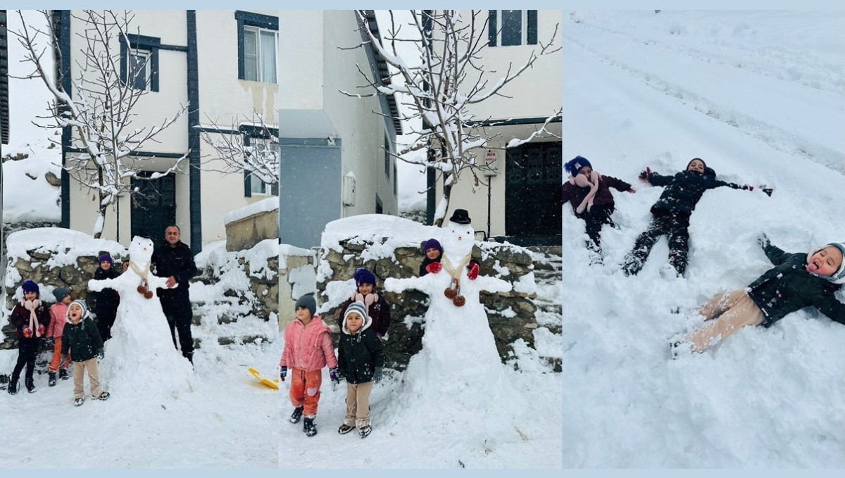 Hakkarili çocukların kardan adam sevinci