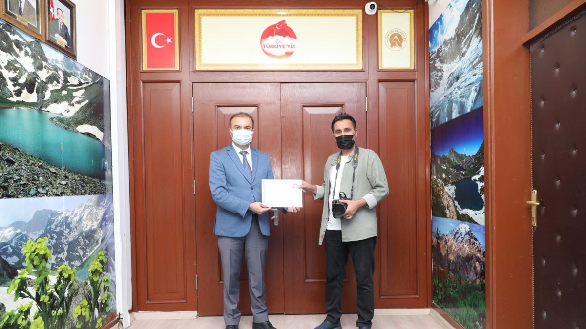 İHA Temsilcisi Taş'a teşekkür belgesi