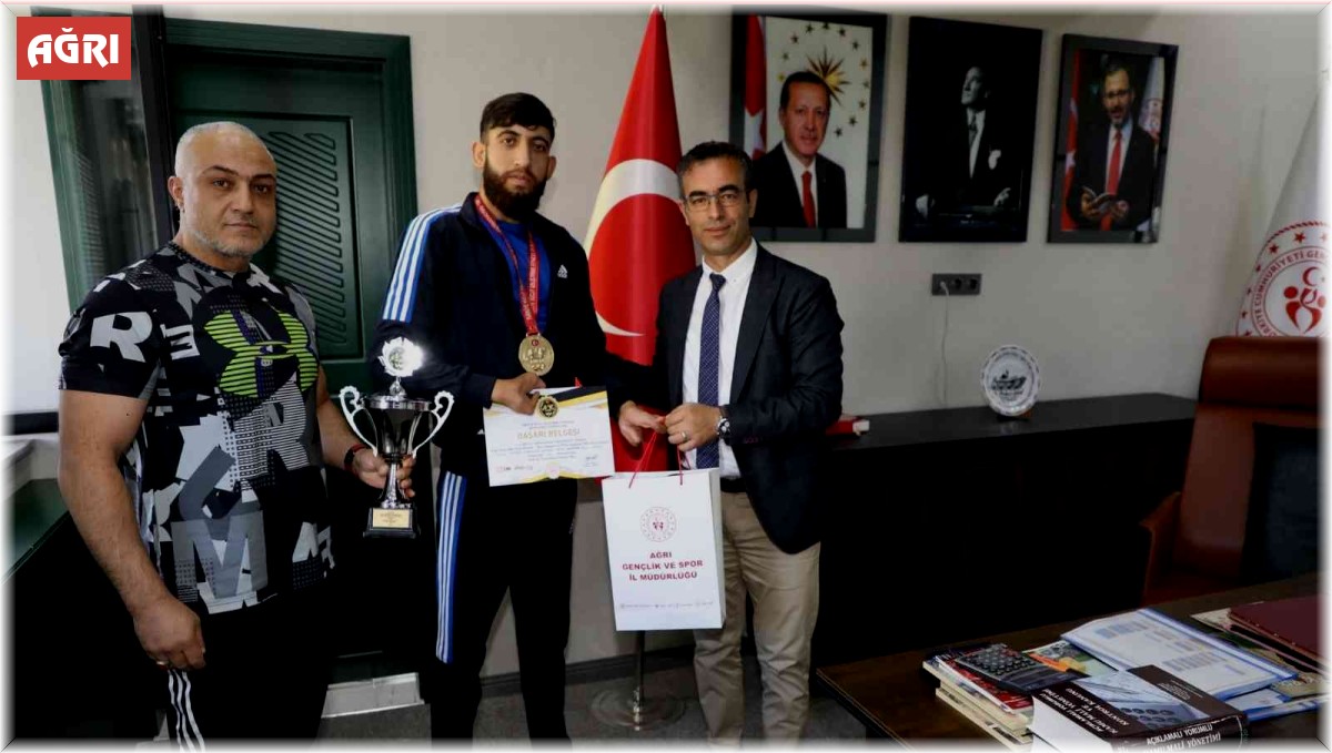 İl Müdürü Din, şampiyon sporcuyla bir araya geldi