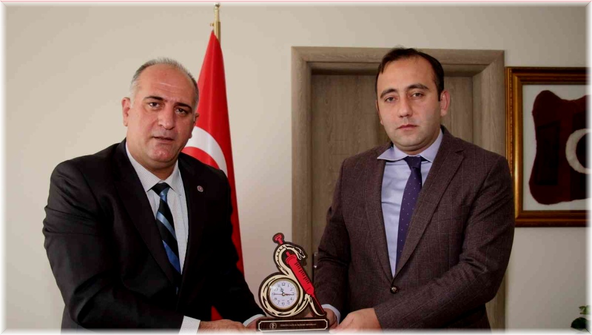 Özden Oltu Kaymakamı Bakkal'a ziyaret etti