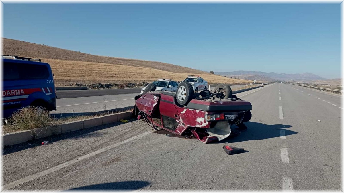 Takla atan otomobilden 8 metre uzağa fırladı