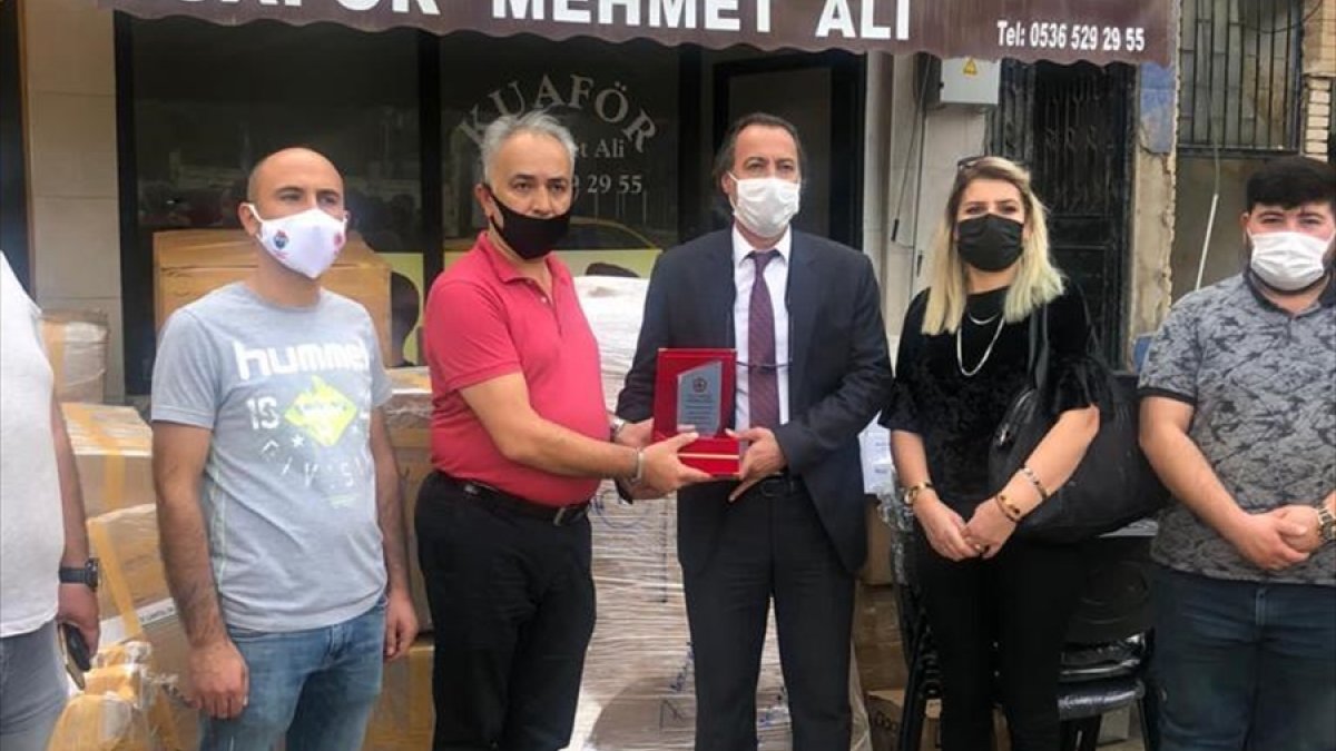 Van'dan Giresun'daki selden zarar gören berber ve kuaförlere destek