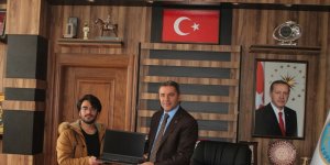 Korkut Belediye Başkanı Pekbay, tıp fakültesini kazanan öğrenciyi ödüllendirdi