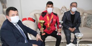 Kaymakam Avcı, Milli Atlet Sezgin Ataç'ı ziyaret etti