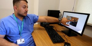 Elazığ'da beline açılan deliklerden çamaşır ipi geçirilen hasta şifa bekliyor