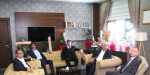 İlçe belediye başkanlarından Milli Eğitim Müdürü Kökrek'e "Hayırlı olsun" ziyareti