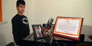 Cumhurbaşkanı Erdoğan, 'kusursuz kulak' Bager'in piyano hayalini gerçekleştirdi