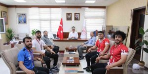 Şampiyon haltercilerden Müdür Özsoy'a ziyaret