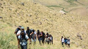 Dağcılardan doğa yürüyüşü ve yüzme etkinliği