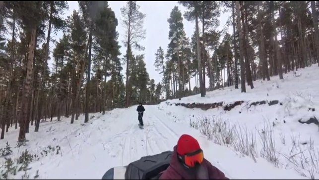 Kars'ta 2 kişi ATV araca bağladığı halatla snowboard yaptı