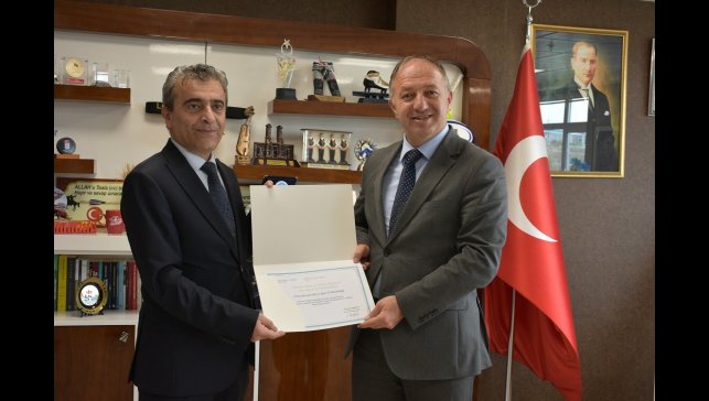 Bedir'den Çakmur'a teşekkür sertifikası