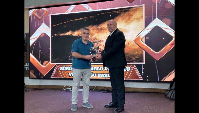 İHA muhabiri Özkan Olcay, birincilik ödülünü aldı