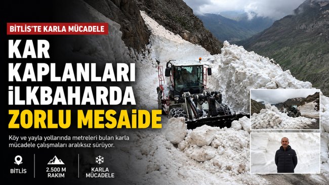 Bitlis'te mayıs ayında iş makinesini aşan karda yol açma mesaisi