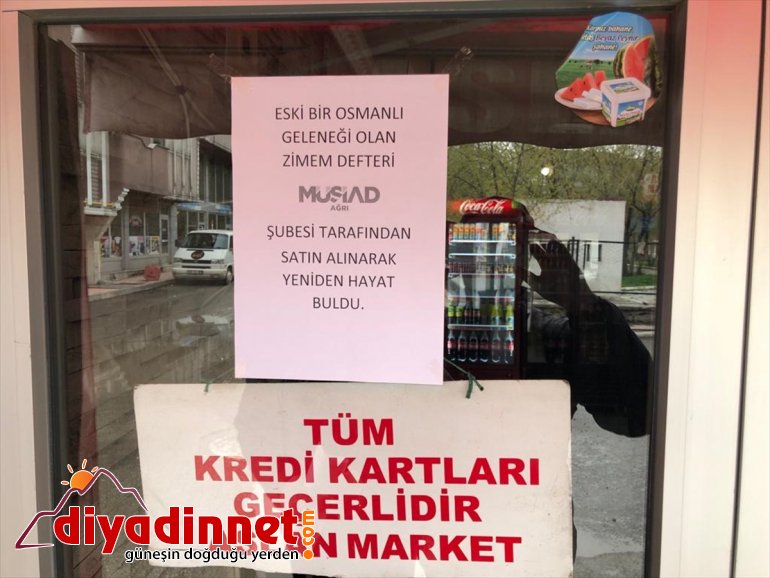 MÜSİAD Ağrı Şubesi ihtiyaç sahiplerinin veresiye defterlerindeki borçlarını ödedi