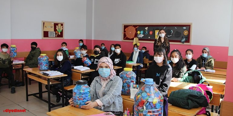 Karlıovalı öğrenciler engellilere umut olmak için 10 bin mavi kapak topladı1