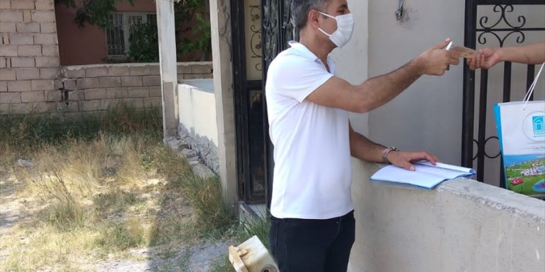 Tuşba'da ailelere bayram yardımı